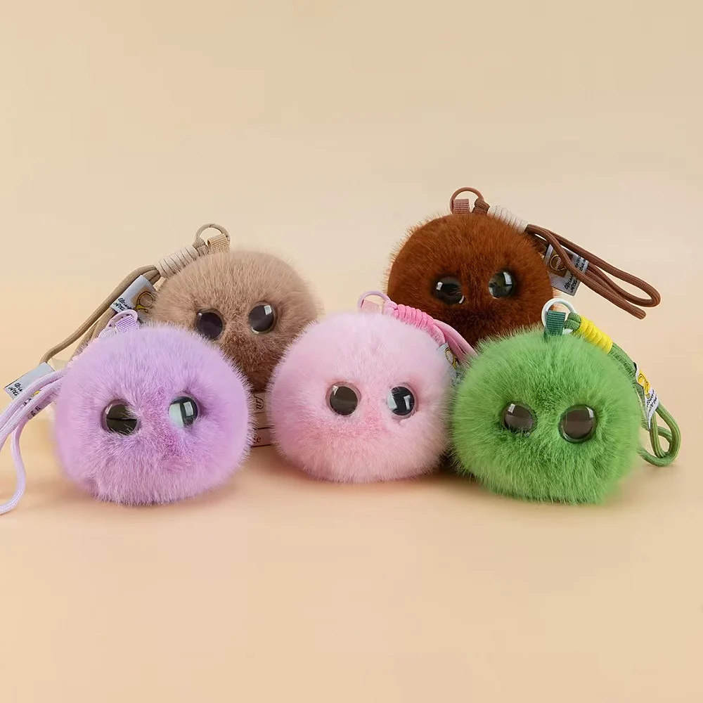 Pom-pom charms collected as a set